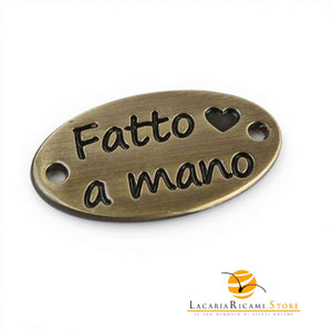Etichetta HANDMADE In Metallo - MAF Accessories - Colore: OVALE 25x13mm - BRONZO - by LacariaRicami.Store