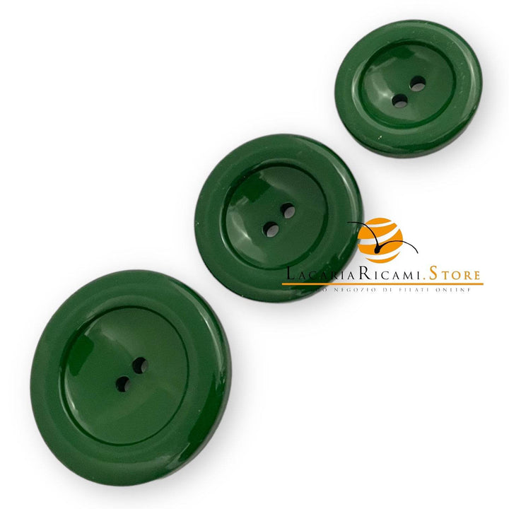 Bottone in poliestere verde con due fori per il prodotto SandraB Grandioso