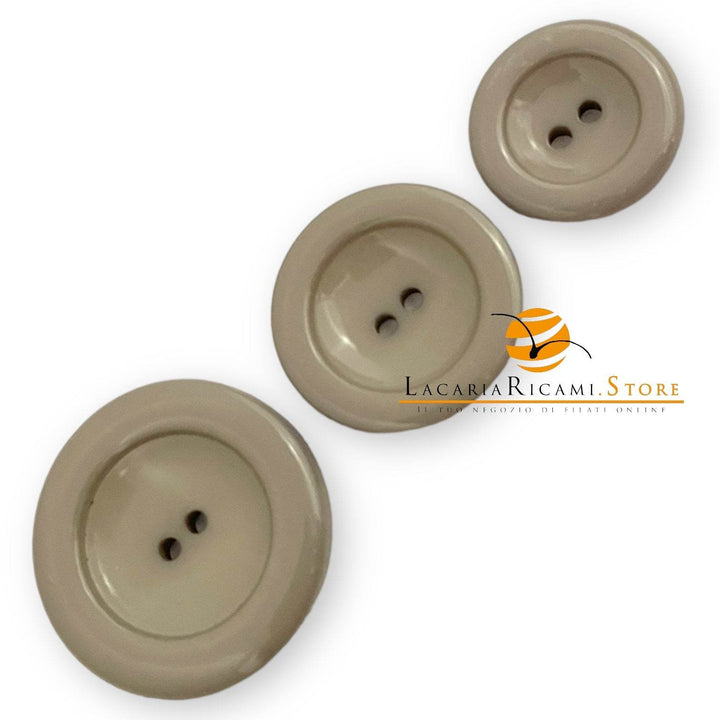 Tre bottoni beige a due fori per il prodotto BOTTONE in Poliestere SandraB Grandioso