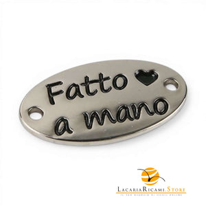 Etichetta HANDMADE In Metallo - MAF Accessories - Colore: OVALE 25x13mm - ARGENTO - by LacariaRicami.Store